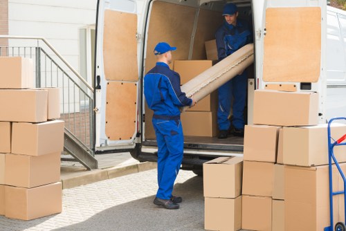 Removal van and moving boxes in Bermondsey street setting