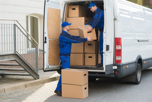 Local furniture removal team handling a sofa pick-up in Bermondsey
