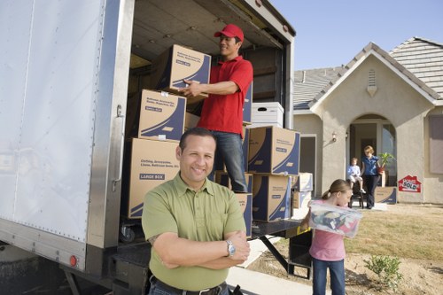 Professional movers handling furniture in Bermondsey