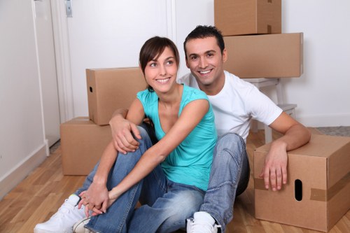 Professional movers handling office equipment during a Bermondsey relocation