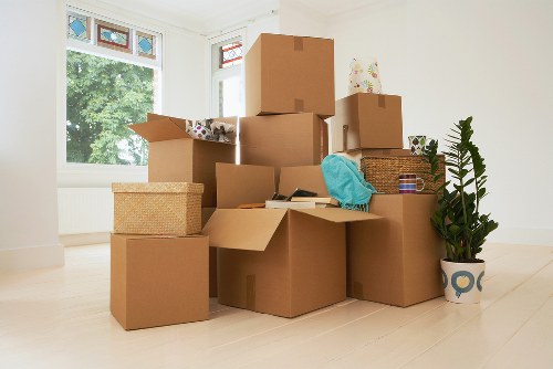 Professional movers loading furniture for a same day removal in Bermondsey