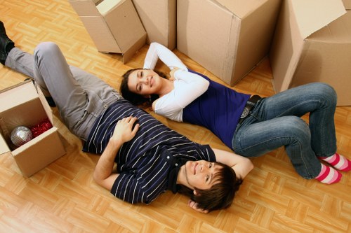 Professional Bermondsey man with van handling belongings carefully
