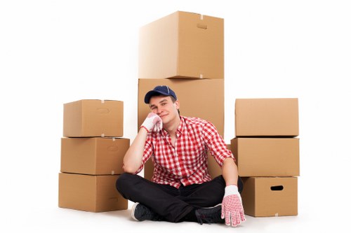 Moving team handling boxes near Bermondsey flats